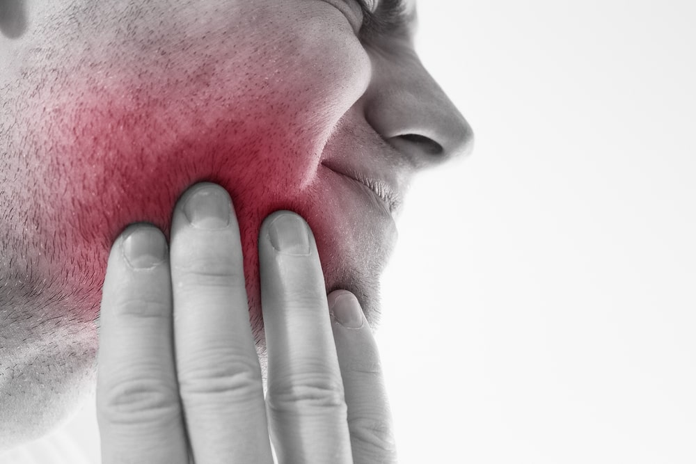 5 Causes Of Tooth Pain When Biting Down Or Touching Teeth Yankee 