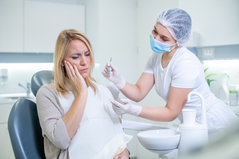 Female Having Tooth Pain Visited Emergency Dentist